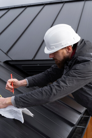 Roofer at work.